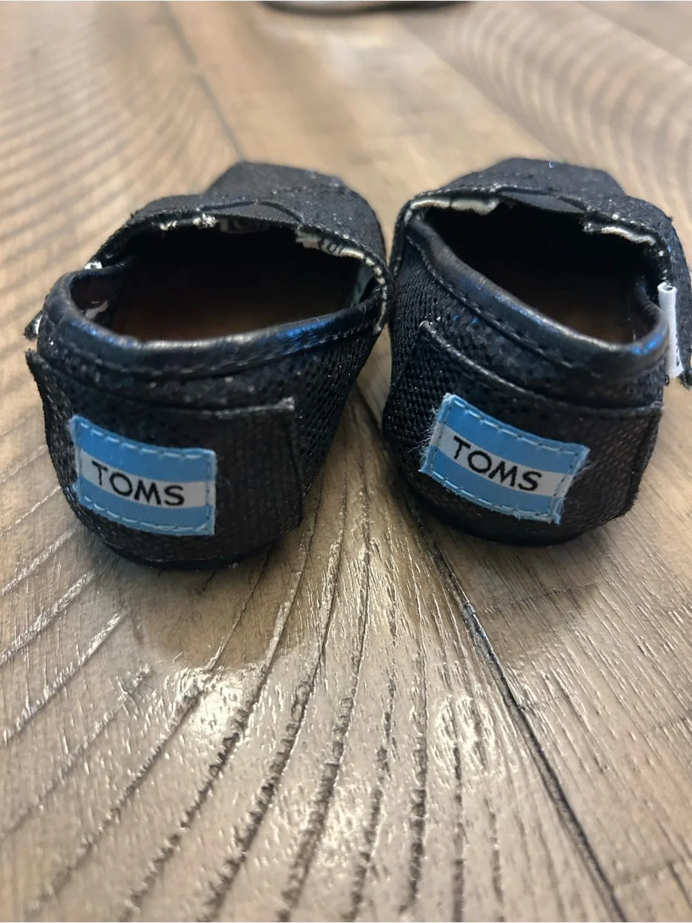 Size 2 Toddler girl TOMS Black Glitter Slip-On Shoes
